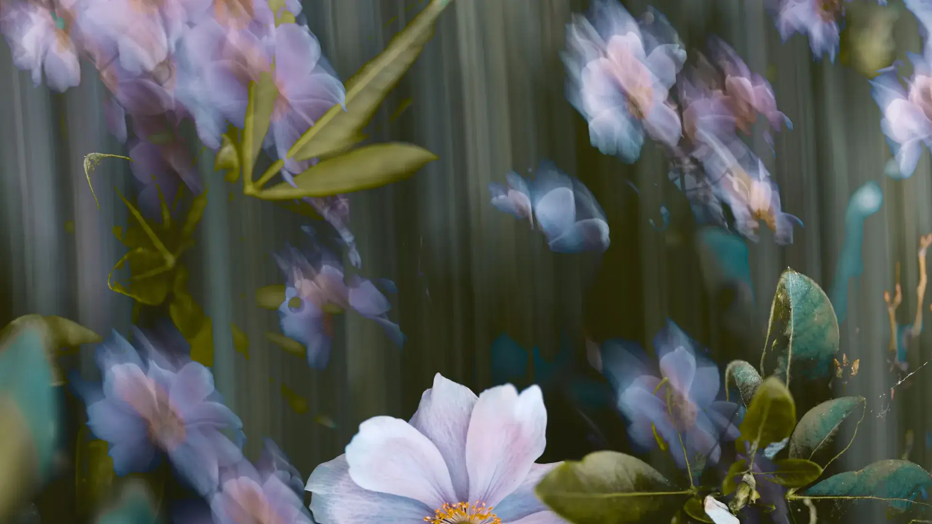 Lilac flowers and olive and teal leaves in soft motion blur, the backdrop of the Vinoly brand